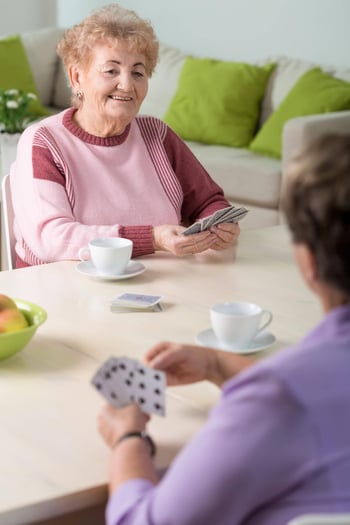 Two-senior-women-playing-cards